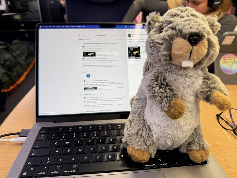 Mungga the Marmot sitting on my laptop on the way home, as the first incarnation of Hule was started on the train to Munich.